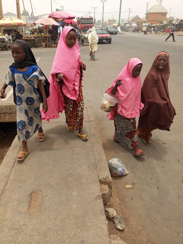 Nigerian street markets bustling with vendors and customers