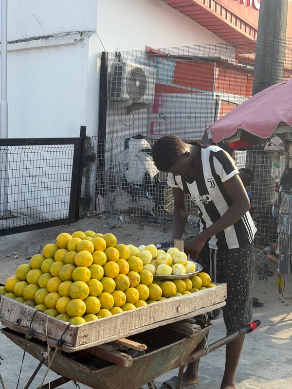 Fruit vendor operates pushcart in Igboefon, Nigeria