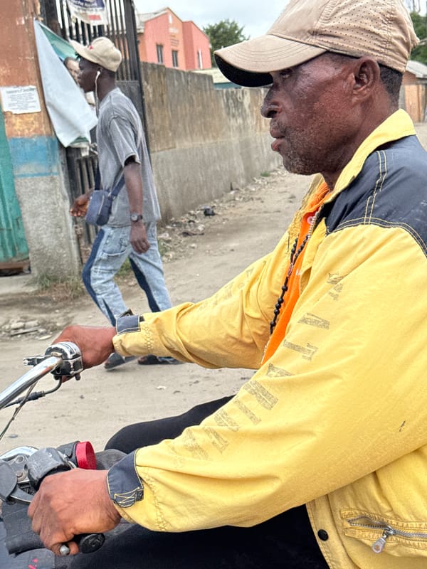 Motorcyclist spotted in yellow jacket in Lekki, Nigeria