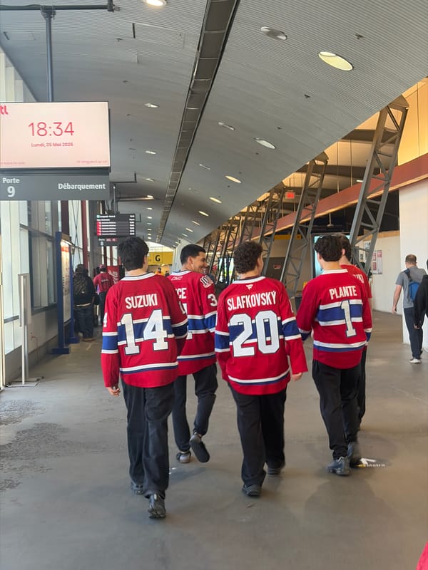 Canadiens fans in matching Suzuki jerseys spotted at Longueuil Metro