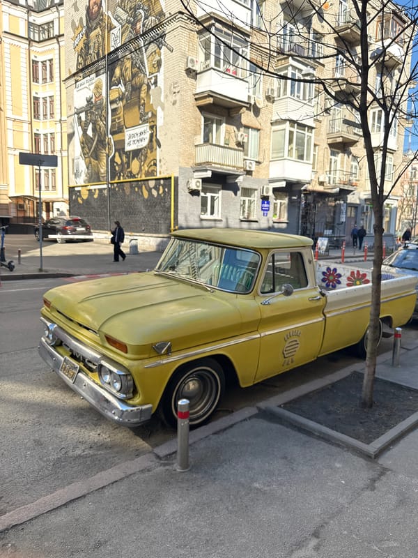 Decorated vintage yellow truck spotted on Kyiv street