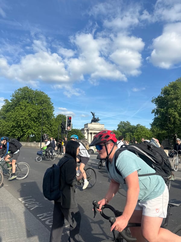 Cyclists stop at red light in London intersection