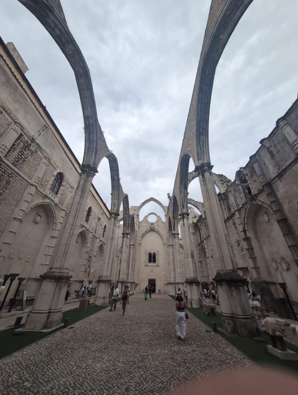 Tourists visit historic Carmo Convent ruins in Lisbon