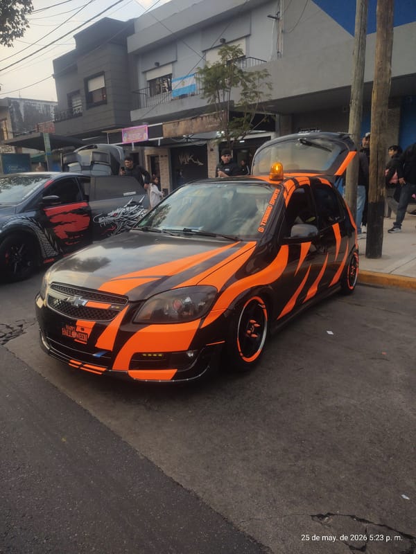 Decorated custom cars gather on Wilde Argentina streets