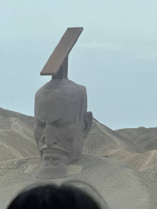 Stone head sculpture observed in Guazhou County, China
