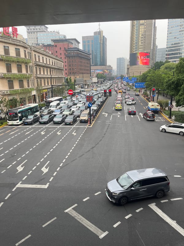 Morning rush hour traffic and park scenes documented in Shanghai