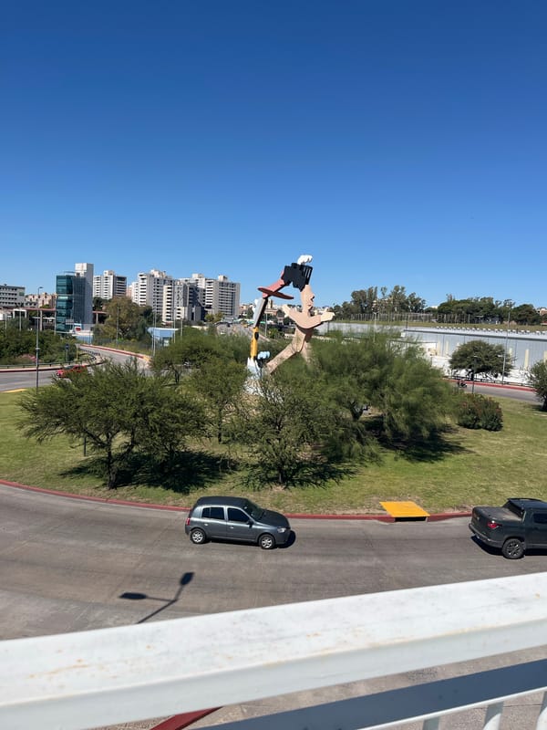 Bridge observer documents Cordoba landmarks including Bicentennial Lighthouse