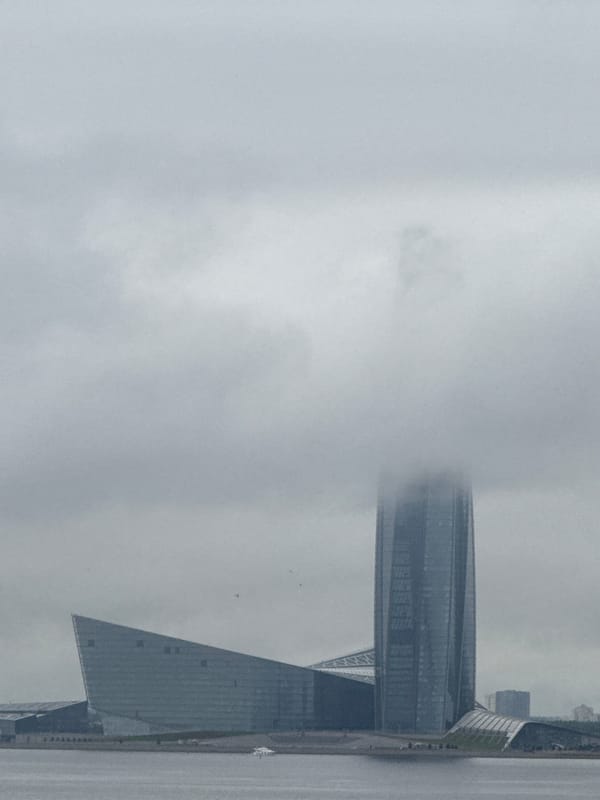 Saint Petersburg skyscrapers dissolve into heavy summer fog