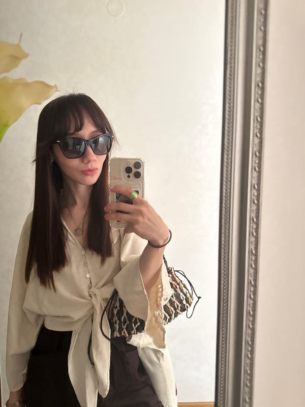 Woman takes mirror selfie in Novi Sad apartment