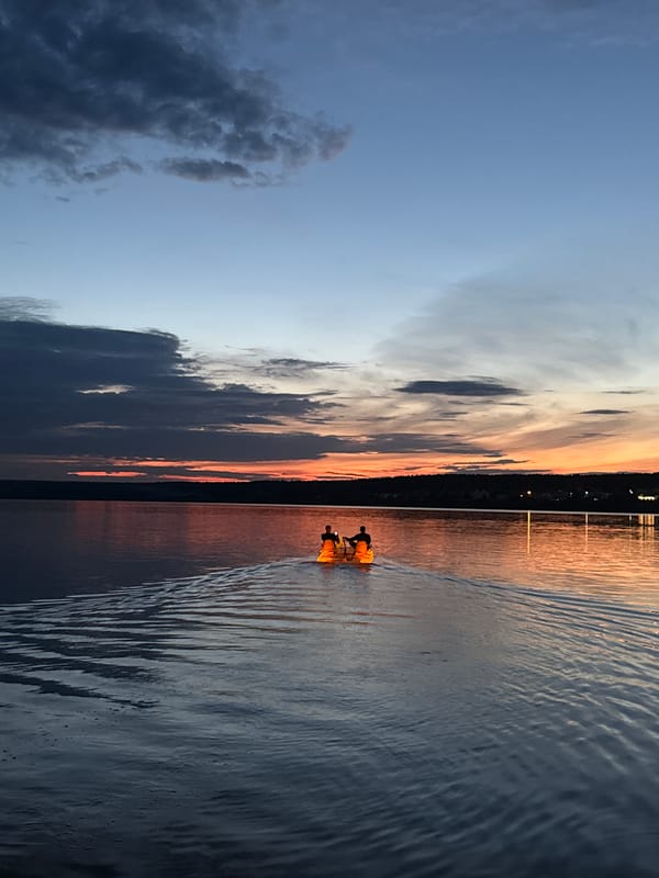 Evening pedal boat ride on a Votkinsk lake at sunset