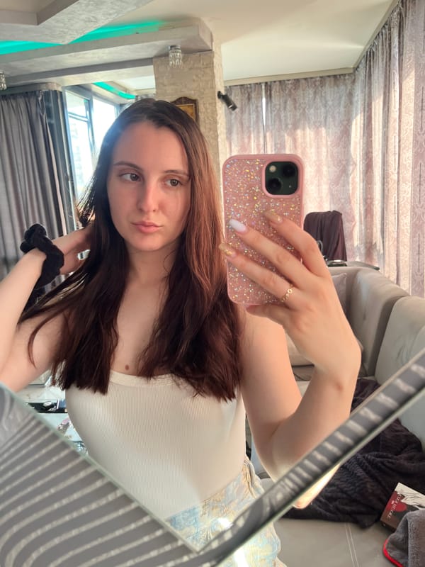 Woman documents quiet afternoon selfies and reading in Pleven