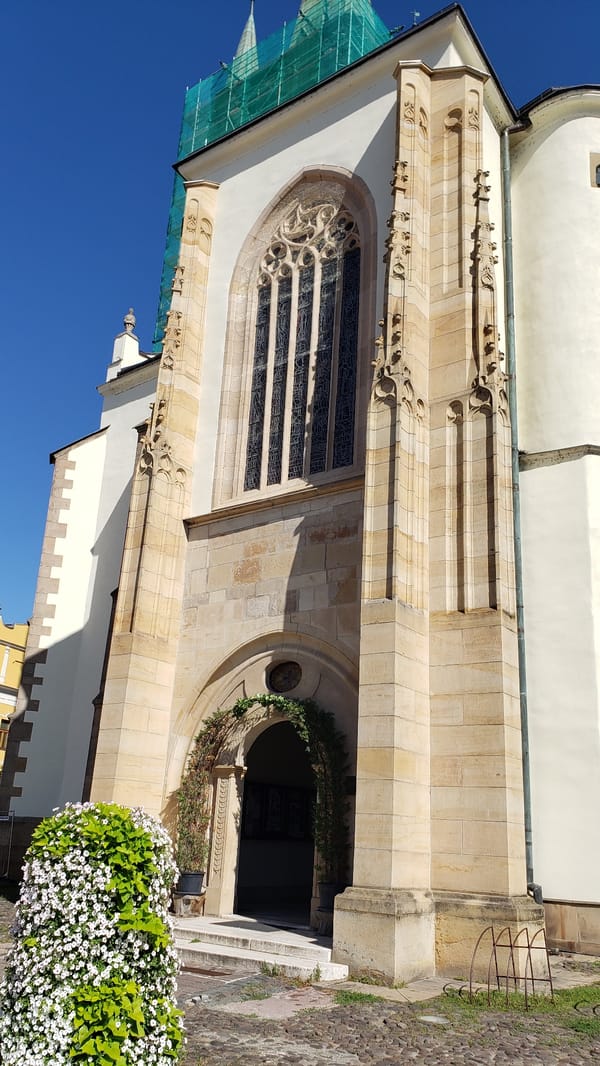 Sunday morning in Prešov's old town, churches to café terraces