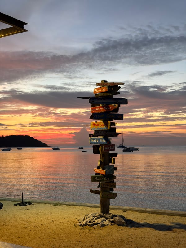 Ko Samui beach at dusk: signs, eats, and calm water