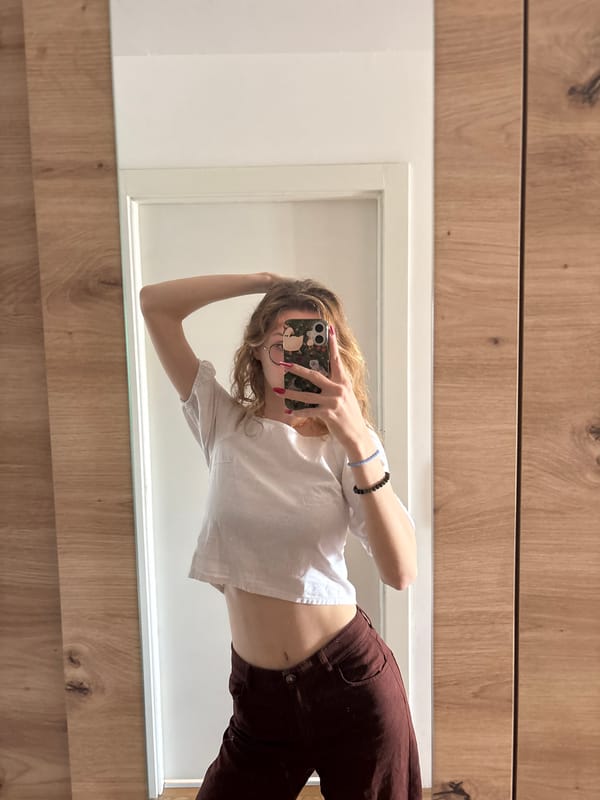 Woman takes multiple selfies in Kragujevac, Serbia