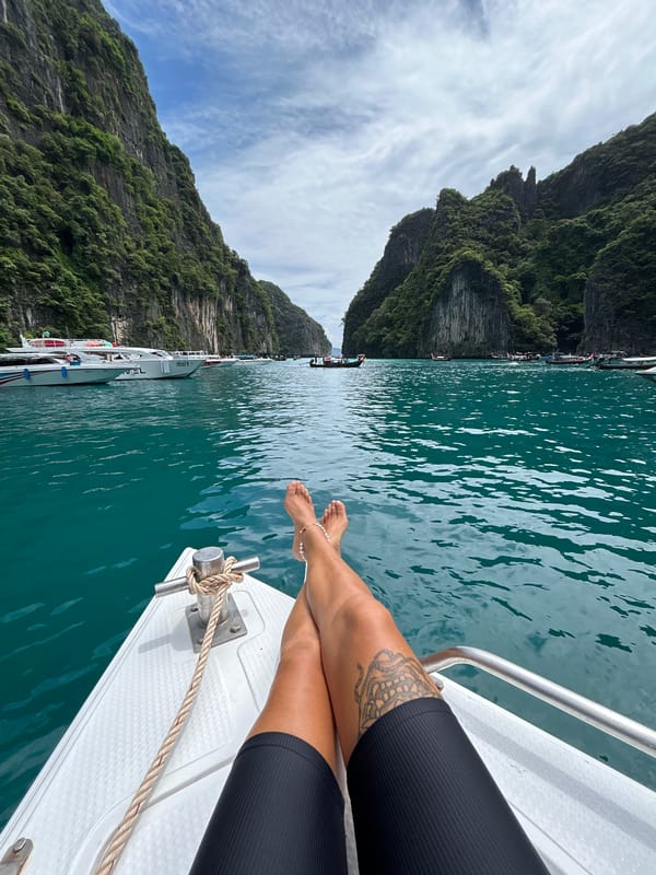 Relaxing on a boat bow in Ao Nang's turquoise waters