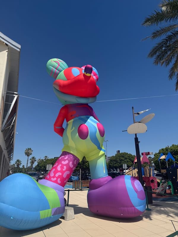 Colorful inflatable cartoon character on plaza in Aldaia