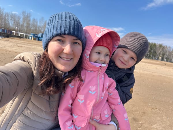 Family enjoys morning waterfront outing in Chaikovsky, Russia