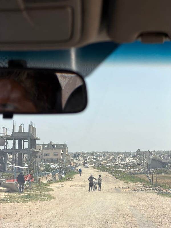 Vehicle interior view captured on Khan Yunis road