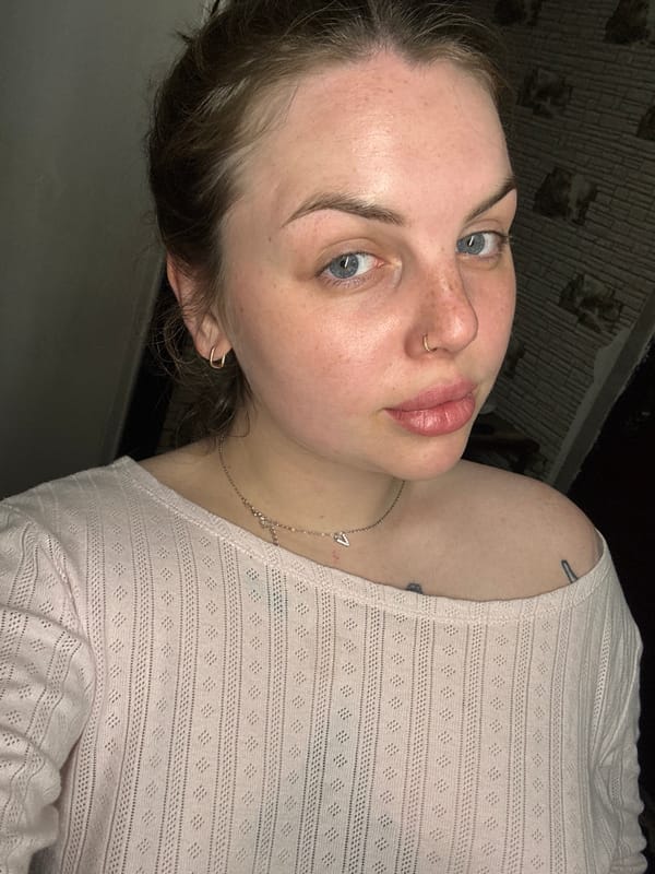 Woman takes selfies during brief photo session in Ukraine