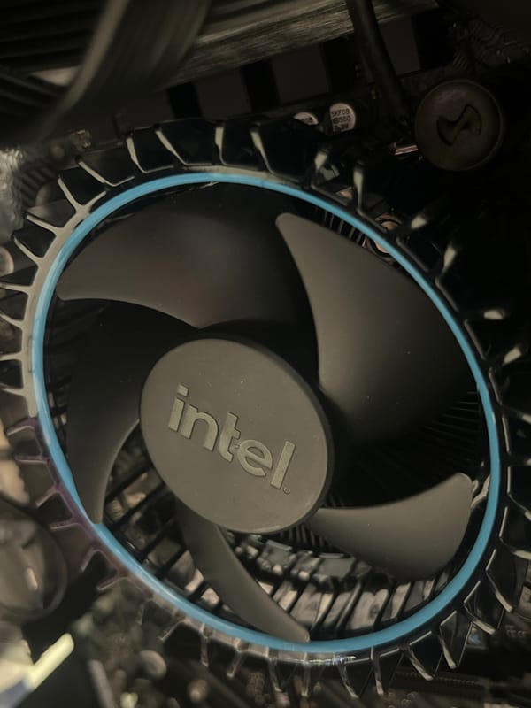 Computer builder documents Intel CPU cooler installation