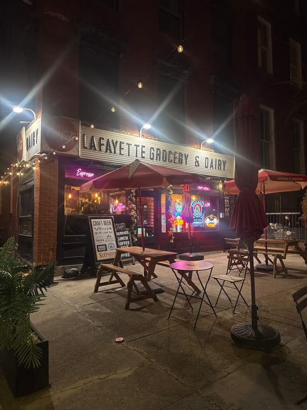 Late night view of Lafayette Grocery storefront in NYC