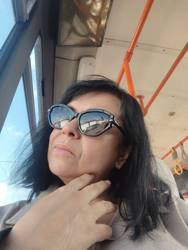 Travel day selfies: streets, buildings, and a train ride
