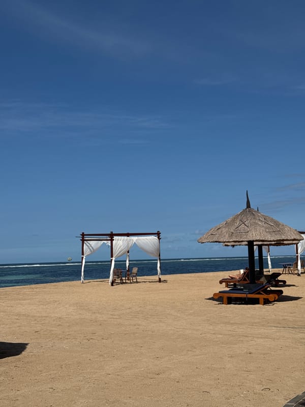 Traditional gathering documented at Bali beach resort early morning