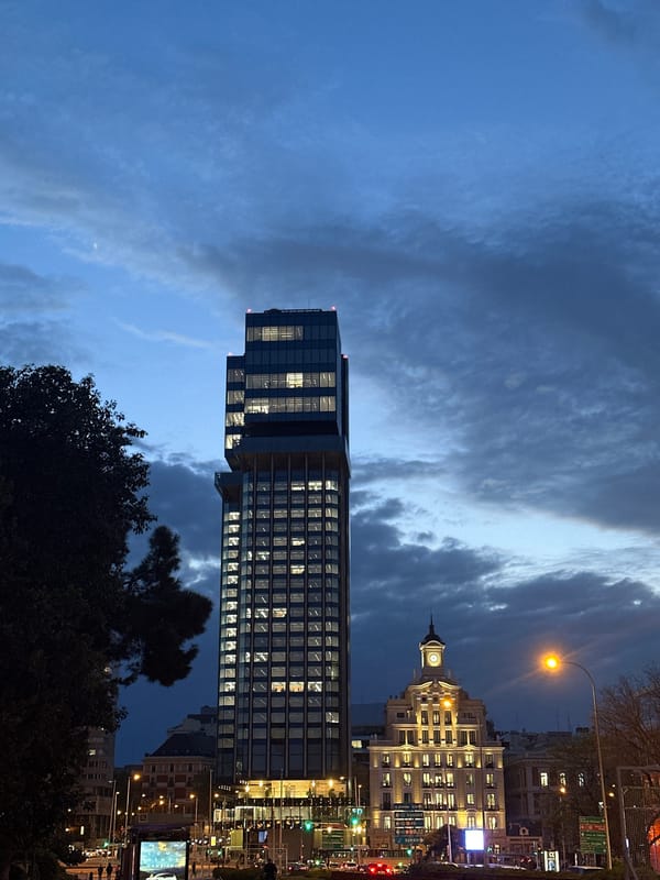 Spanish flag and churches documented in Madrid afternoon