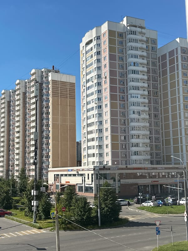 Sunny morning street life in a Podolsk residential district