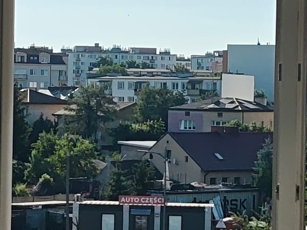 Mixed urban streetscape in Mława, Poland
