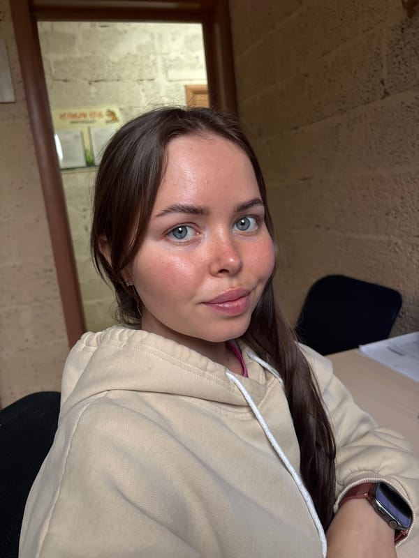 Woman in beige sweatshirt observed in Russian village