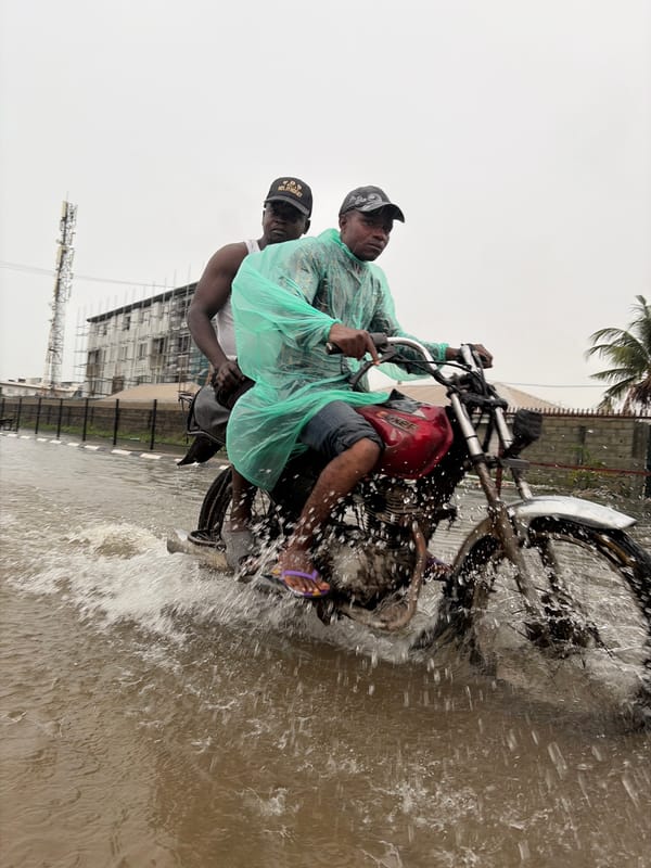 Igboefon residents push through flooded streets during heavy rain