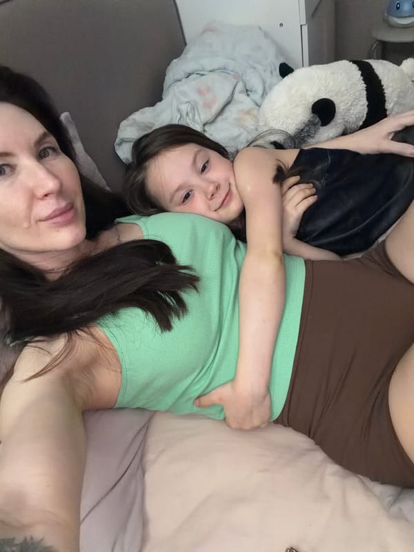 Quiet family moment captured indoors in Perm, Russia