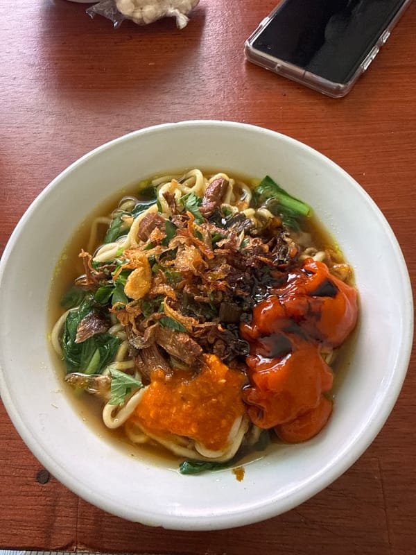 Noodle soup meal documented in Kuta, Indonesia