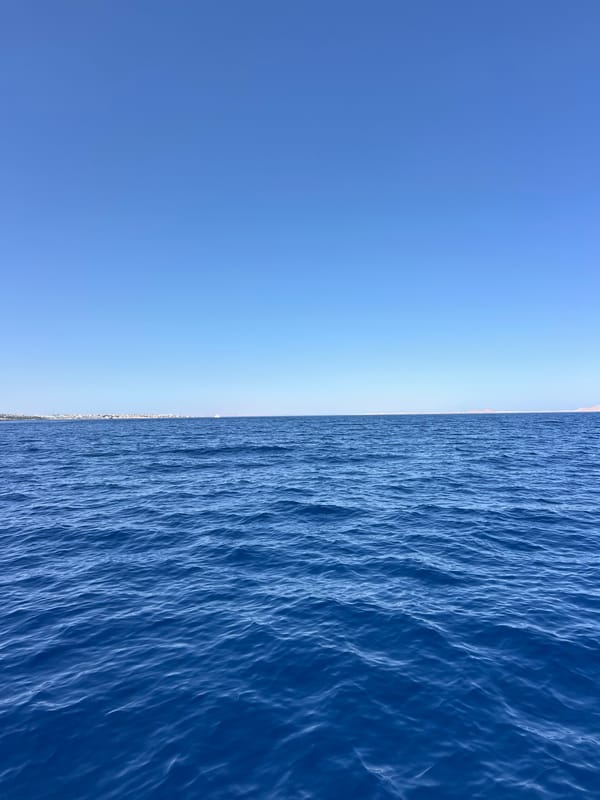 Boat ride off the Sharm El Sheikh coast, city in view