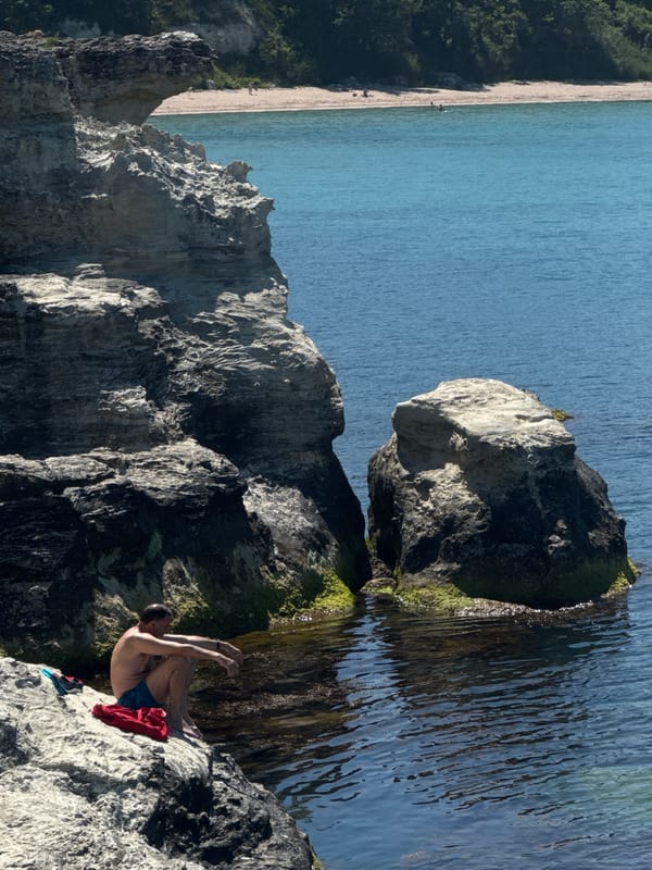 Beach day captured along Tsarevo's rocky Black Sea coastline