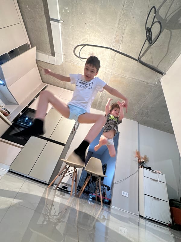 Boys captured mid-jump in rotated photo in Moscow