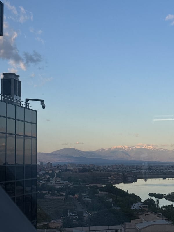 Elevated cityscape view captured from Yerevan high-rise building