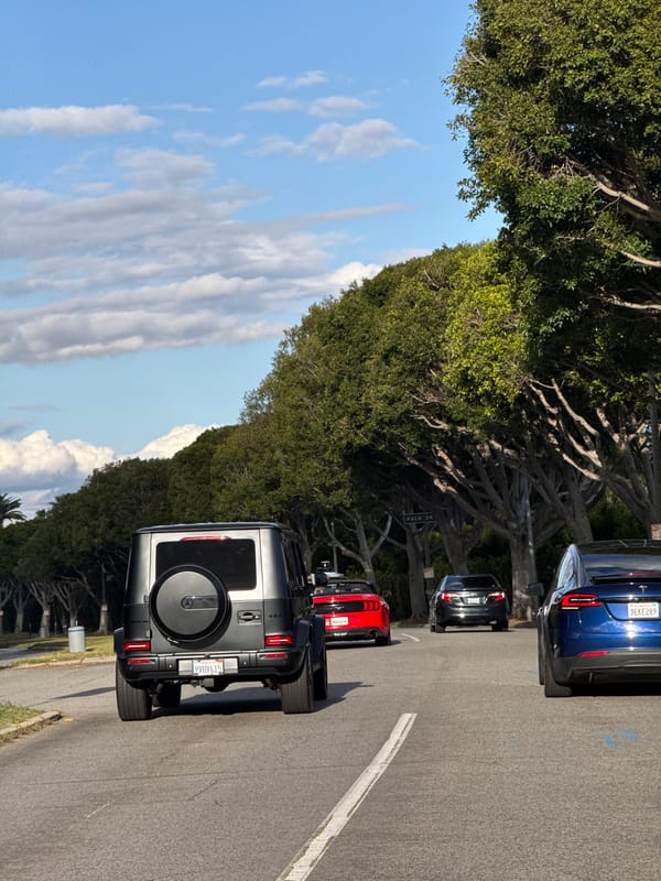 Vehicle gathering observed on Beverly Hills street early morning