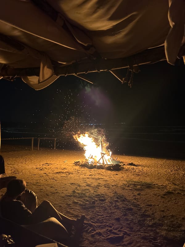 Beachside bonfire burns bright on a Sri Lankan shore