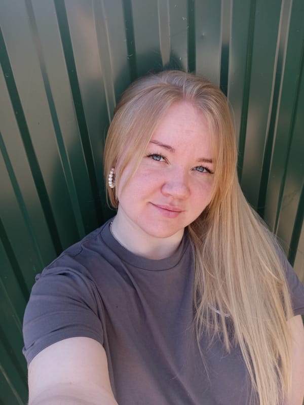 Woman takes selfies around Фоки, Russia in early morning