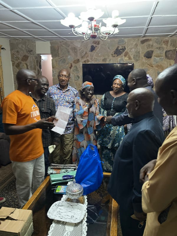 Community gathering in residential setting, Bukuru Nigeria