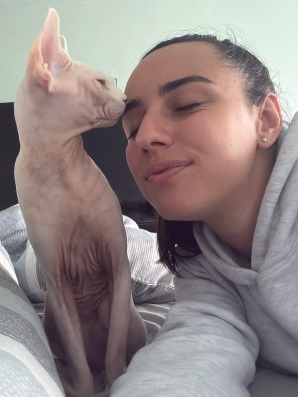 Woman shares tender moments with Sphynx cat in Sofia