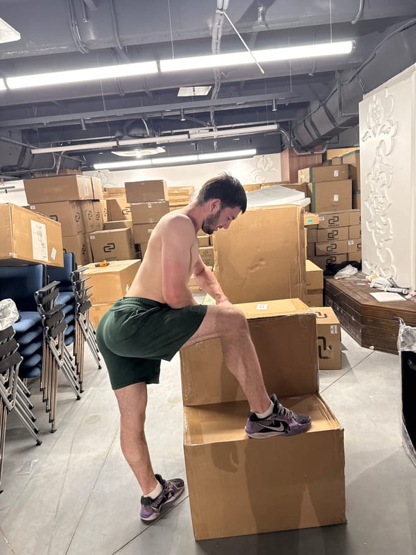Men exercise and work in Kazan storage facility