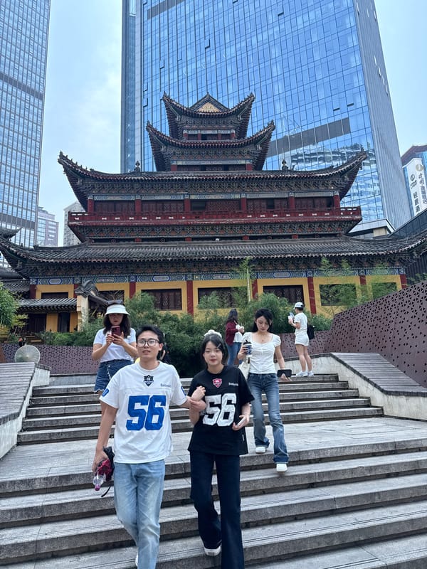 Young people gather on stone steps in Yuzhong District