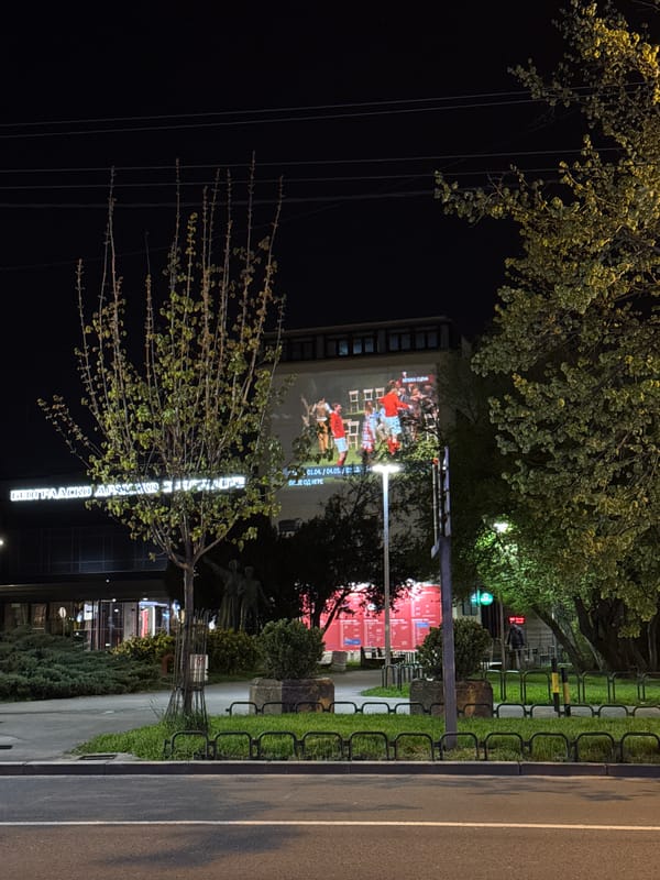 Belgrade evening scenes show building projection, cafe renovation