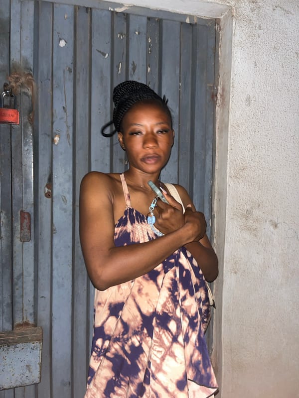 Late-night photos outside a metal gate in Jos, Nigeria