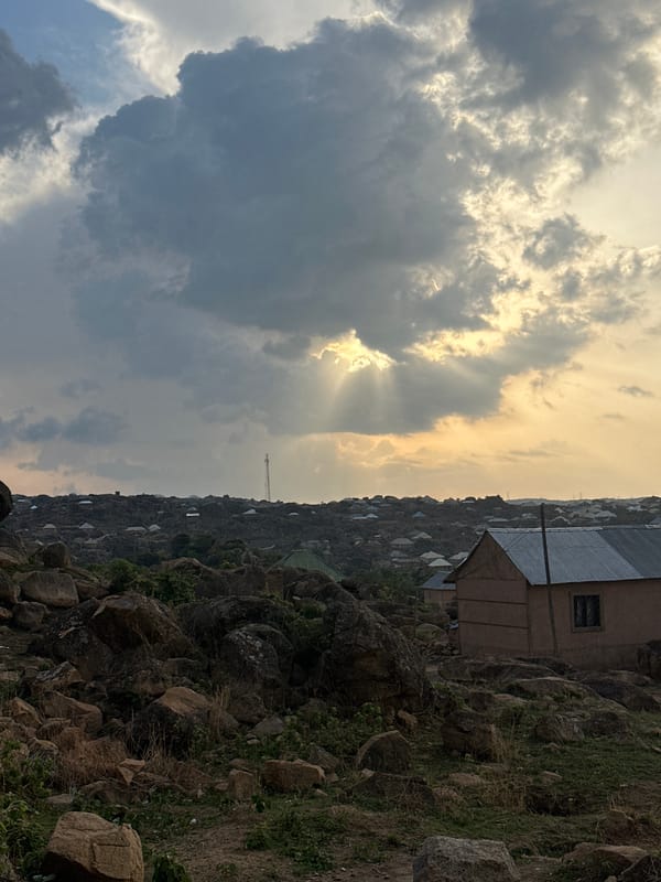 Late afternoon light illuminates Jos, Nigeria's rocky landscape