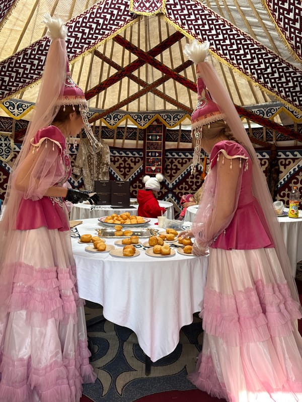 Traditional Kazakh costume displayed in yurt cultural exhibit, Astana