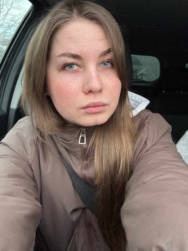 Woman takes selfie in car in Chaikovsky, Russia